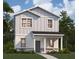 Charming two-story home featuring vertical siding, stone accents, and a welcoming front porch at 5602 Stockade Blvd, St Cloud, FL 34771