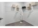 Efficient walk-in closet offers ample storage with shelving and hanging space in a bright, neutral space at 5602 Stockade Blvd, St Cloud, FL 34771