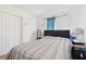 Bright bedroom featuring a comfortable bed and bright curtains at 5719 Meridian Way, Orlando, FL 32808