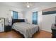 Bright bedroom featuring a comfortable bed and bright curtains at 5719 Meridian Way, Orlando, FL 32808