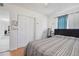 Bright bedroom featuring a comfortable bed and bright curtains at 5719 Meridian Way, Orlando, FL 32808