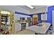Open kitchen featuring stainless steel appliances, subway tile backsplash, and abundant cabinet space at 5776 Falling Tree Ln, Port Orange, FL 32127