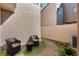 Landscaped backyard with chairs and manicured plants at 643 Woodridge Dr, Fern Park, FL 32730