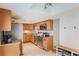 Modern kitchen featuring stainless steel appliances, granite countertops, and ample storage, perfect for cooking at 643 Woodridge Dr, Fern Park, FL 32730