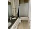 Bathroom featuring double sinks, granite countertops, and a shower-tub combination at 7112 Enchanted Lake Dr, Winter Garden, FL 34787