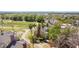 Aerial view showcases the townhome, lush landscaping, and access to community amenities at 7512 Seven Eagles Way # 7512, Reunion, FL 34747