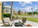 View from a patio of multi-story yellow condos at 7512 Seven Eagles Way # 7512, Reunion, FL 34747