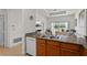 Kitchen with granite counters overlooks the living space at 7512 Seven Eagles Way # 7512, Reunion, FL 34747