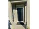 The covered front porch has a black door with a number at 8989 Lee Vista Blvd # 2106, Orlando, FL 32829