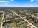 Experience an aerial view of a peaceful community with easy access to a serene lake at 1139 9Th Ave, Deland, FL 32724