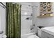 Bathroom featuring a shower/tub combination with white subway tile and a decorative shower curtain at 1139 9Th Ave, Deland, FL 32724