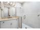 Modern bathroom with a glass-enclosed shower, sleek vanity, and contemporary fixtures for a spa-like feel at 1148 Grand Traverse Pkwy, Reunion, FL 34747