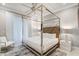 Beautiful bedroom featuring a bed with chrome frame and textured headboard at 1148 Grand Traverse Pkwy, Reunion, FL 34747