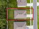 An aerial view showing the lot lines and the location of the home in the neighborhood at 1150 August Sky Dr, Deltona, FL 32738