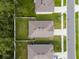 Aerial view showcasing the layout of the house with other homes in the residential neighborhood at 1150 August Sky Dr, Deltona, FL 32738
