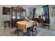 Elegant dining room featuring classic china cabinet and traditional decor with a window view at 1150 August Sky Dr, Deltona, FL 32738