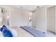 Relaxing bedroom featuring neutral walls, a comfortable bed, and an adjacent bathroom at 1224 Teal Creek Dr, St Cloud, FL 34771