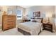 Inviting bedroom decorated with UCF Knights theme, featuring stylish furniture and ample light at 1224 Teal Creek Dr, St Cloud, FL 34771