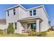 Rear exterior view showcases a covered patio, perfect for enjoying the outdoors at 1224 Teal Creek Dr, St Cloud, FL 34771
