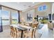 Open-concept living space with high ceilings and sliding doors, perfect for entertaining and relaxation at 1224 Teal Creek Dr, St Cloud, FL 34771