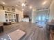 Bright living area boasts wood floors and an open layout, perfect for entertaining at 123 Breezy Oaks Ct, Davenport, FL 33896