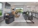 Spacious living room with open access to a patio and other living spaces at 1234 Sand Torch Cir, Davenport, FL 33837