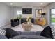 Bright and inviting living room with sleek furniture and stylish decor at 1234 Sand Torch Cir, Davenport, FL 33837