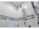 Shower featuring modern tiling and a mounted shower head at 1234 Sand Torch Cir, Davenport, FL 33837