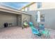 The backyard has a patio, chairs, a table, and a grill at 12862 Strode Ln, Windermere, FL 34786