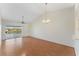 Bright, spacious living room with vaulted ceilings and a sliding door to the outdoors at 13852 Timberbrooke Dr # 203, Orlando, FL 32824