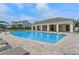 Beautiful community pool with a spacious deck, covered seating, and well-maintained landscaping, a great place to unwind at 14007 Picard Aly, Winter Garden, FL 34787