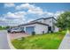 Spacious townhome features a two-car garage and well-maintained landscaping at 14007 Picard Aly, Winter Garden, FL 34787