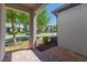 Outdoor patio with brick pavers and a neighborhood view at 14007 Picard Aly, Winter Garden, FL 34787