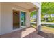 Outdoor patio with brick pavers and view of the street at 14007 Picard Aly, Winter Garden, FL 34787