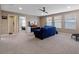 Large bonus room with carpeting, recessed lights and lots of natural light at 14172 Hutchinson St, Winter Garden, FL 34787