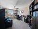 Bright office space with ceiling fan, large window, and built in bookcases at 14172 Hutchinson St, Winter Garden, FL 34787