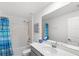 Clean bathroom with tub/shower combo, and a vanity with ample counter space at 1696 Tohoqua Blvd, Kissimmee, FL 34744