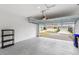 Clean and spacious garage with epoxy flooring, ready for parking and storage at 1696 Tohoqua Blvd, Kissimmee, FL 34744