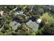 Aerial view of the community featuring tennis courts and a pool at 1707 Stetson Ct, Longwood, FL 32779