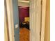 Bedroom features wood floor and red curtains at 1838 Palmerston Cir, Ocoee, FL 34761