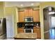 The kitchen is equipped with modern appliances and ample cabinet space with lovely granite counter tops at 1838 Palmerston Cir, Ocoee, FL 34761