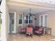 Covered patio with ceiling fan and outdoor furniture at 1838 Palmerston Cir, Ocoee, FL 34761