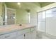 Well-lit bathroom featuring a shower, vanity with a clean design, and a functional layout at 1873 Poinciana Rd, Winter Park, FL 32792