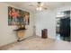 Bright dining area with unique art, ceiling fan and a view of the kitchen appliances at 1873 Poinciana Rd, Winter Park, FL 32792