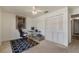 Office area features closet storage, carpet, and a ceiling fan at 1873 Poinciana Rd, Winter Park, FL 32792