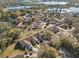 Aerial view of a residential community nestled among trees, close to a serene lake at 205 Hill St # 205, Casselberry, FL 32707