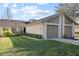 Charming home exterior with well-maintained landscaping, a two-car garage, and inviting curb appeal at 205 Hill St # 205, Casselberry, FL 32707