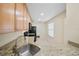 Updated kitchen featuring granite countertops, stainless steel sink, and wooden cabinets, offering modern style at 205 Hill St # 205, Casselberry, FL 32707