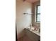 This bathroom features a tile accent wall with a bench at 209 Whippoorwill Dr, Altamonte Springs, FL 32701