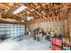 Spacious garage with high ceilings, ceiling fan, and space for vehicles or storage at 2204 Votaw Rd, Apopka, FL 32703